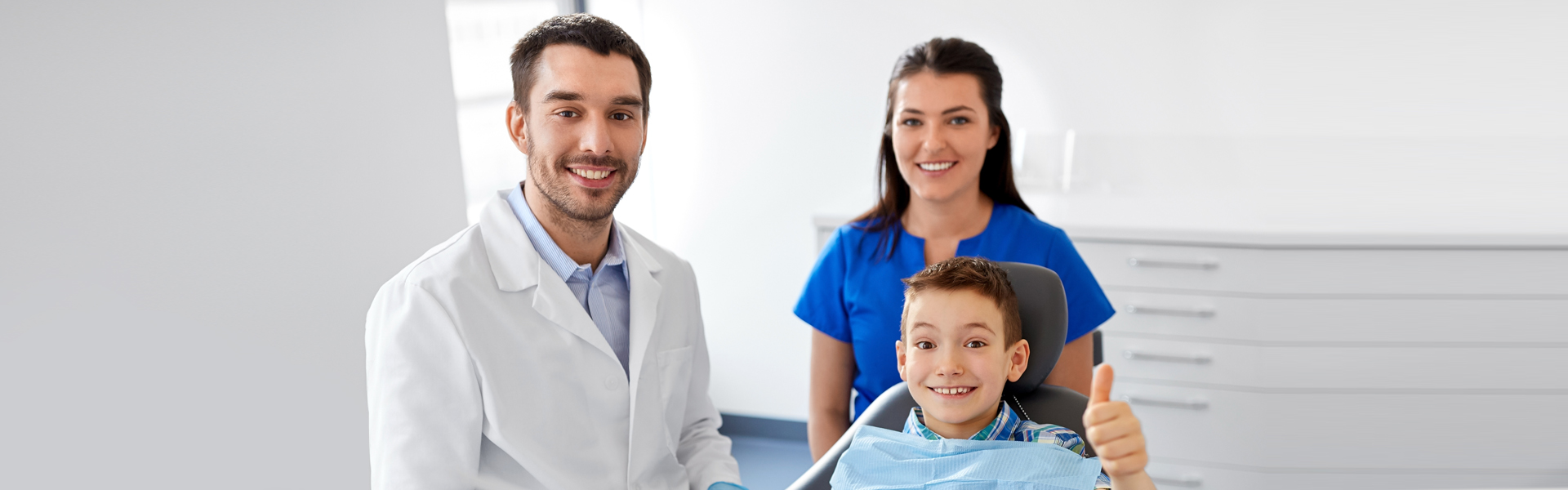 Family dentist consultation with child